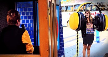 Loved Ones Share Compliments With One Another Through Giant Headphones