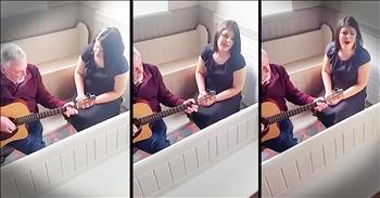 Father And Daughter Sing Irish Folk Song In Empty Chapel